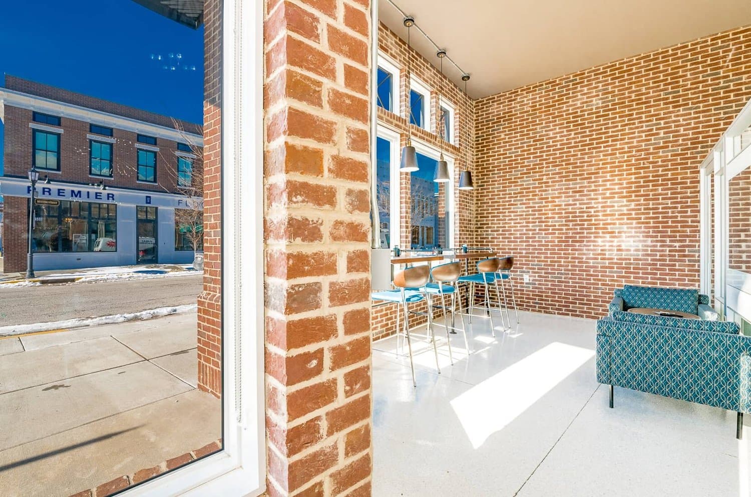 Window view to the street with lounge seating